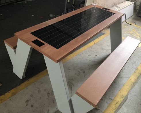 Park table with benches and a built-in solar battery for charging gadgets SMAR EKOT CITY Model SC12